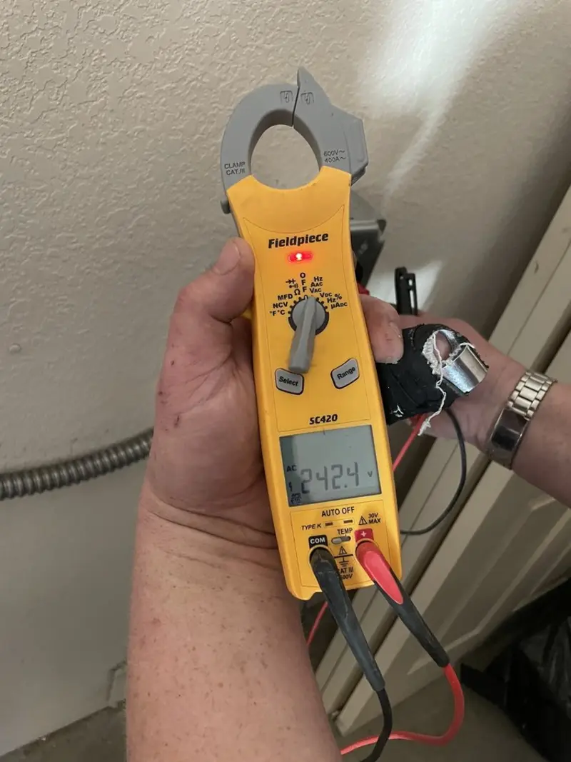 Voltage testing with clamp meter during Aluminum Wiring Replacement in Windsor